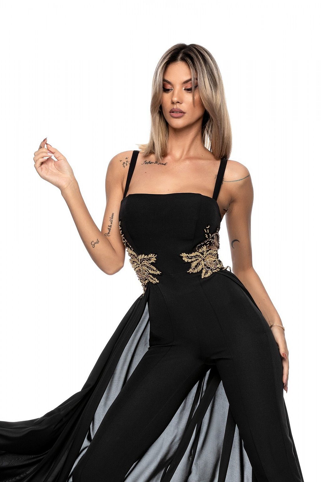 Tuta elegante di colore nero con inserti laterali oro - immagine 3